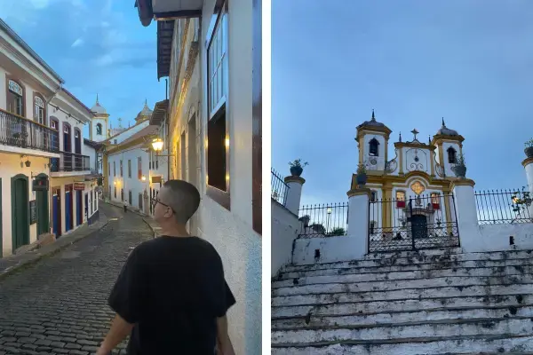 rapaz de blusa preta andando pelas ruas de paralelepipedo