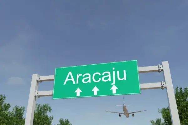 Placa de rodovia indicando para a cidade de Aracaju