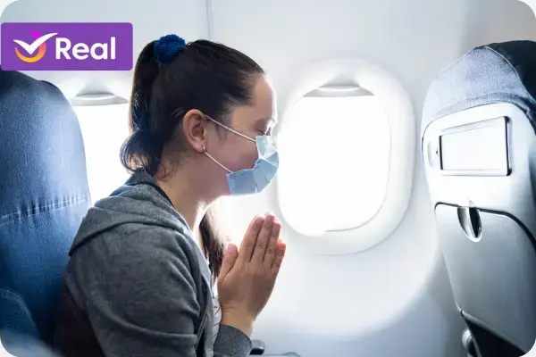 Mulher viajando para o Chile e rezando apra tudo dar certo